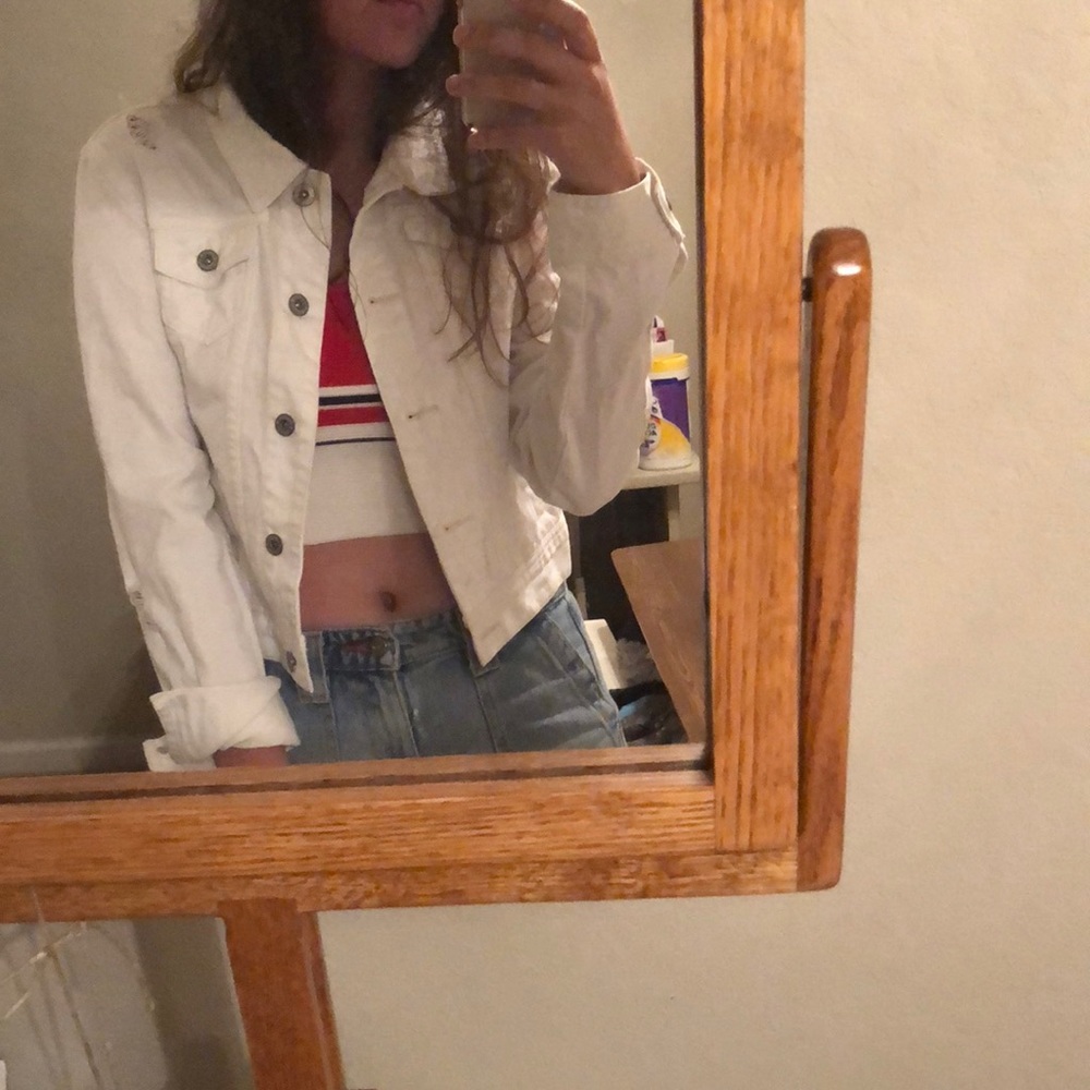 Pre-distressed white denim jacket